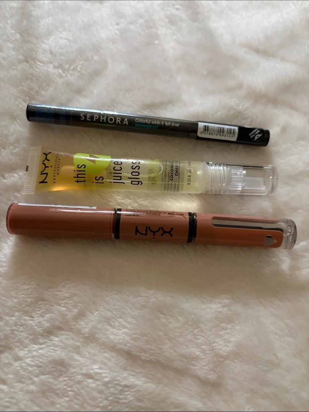 Sephora Black Felt Tip Eyeliner with NYX Clear Gloss and Warm Brown Lip Tint